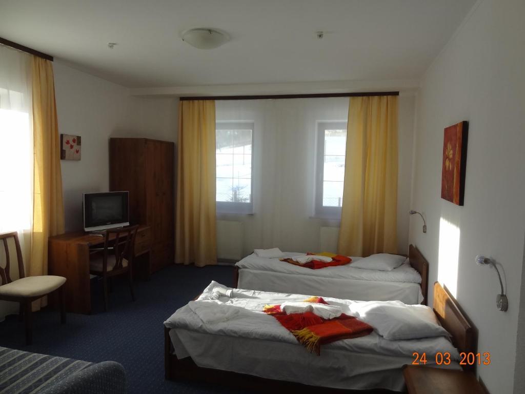 Alpenhof Pansion Hotel Славске Стая снимка